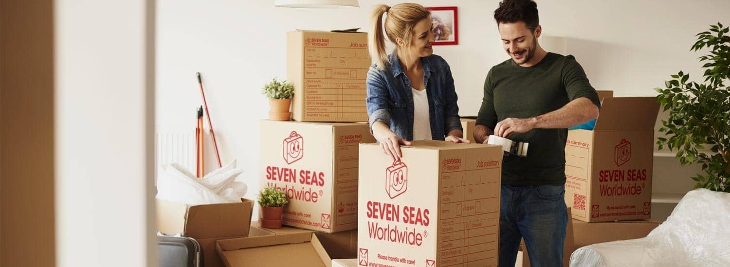 Couple packing for international removals
