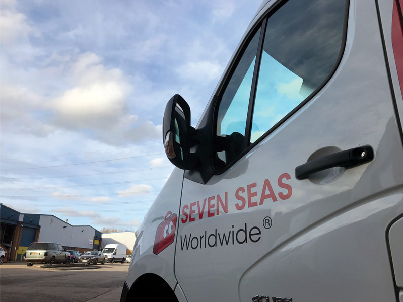 Seven Seas Worldwide van outside a depot
