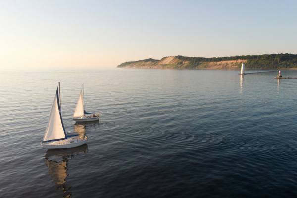Sailboats near Frankfort Light on Lake Michigan