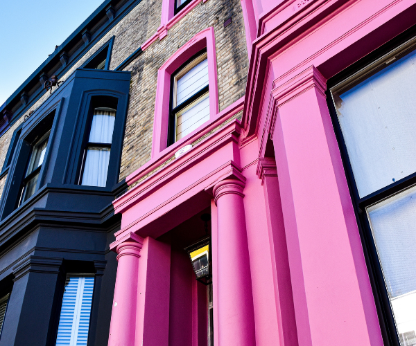 Houses with blue and pink paintwork