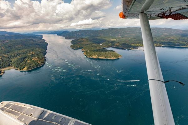 Sea plane flying over Vancouver Island