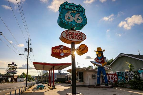 Neon sign and statue in Tulsa, Oklahoma