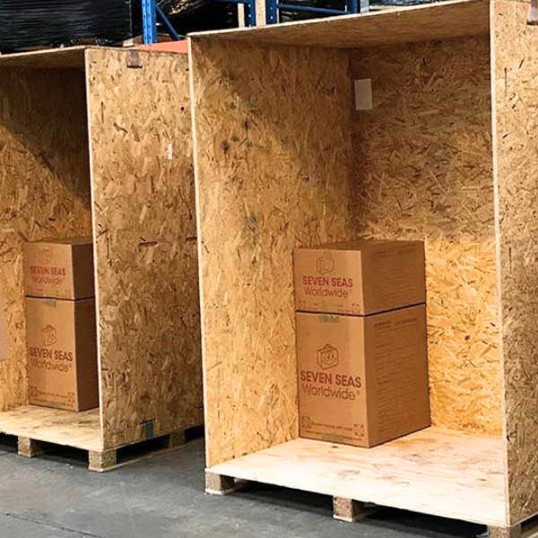Two MoveCube® wooden containers with boxes
