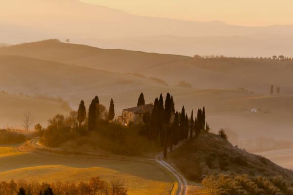 Villa on a hill in Italy at dusk