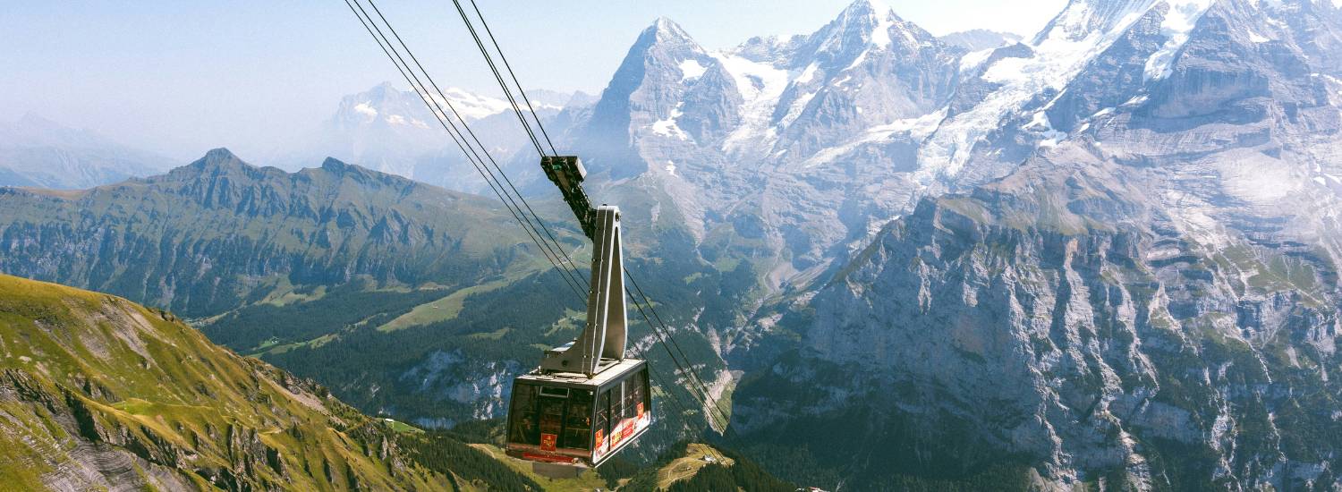 Cable car going down a mountain in Switzerland