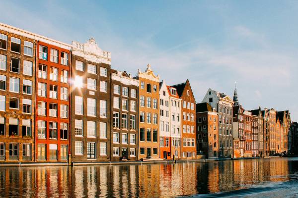 Row of houses along a canal in Amsterdam, the Netherlands