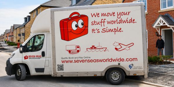 Seven Seas Worldwide removals vehicle collecting household belongings from a residential property