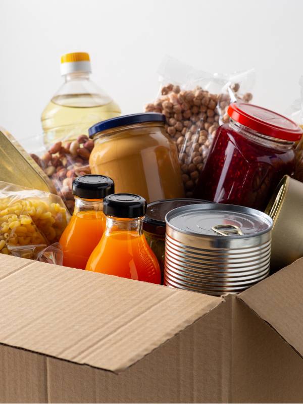 Collection of jars, tins, bottles and packets of food